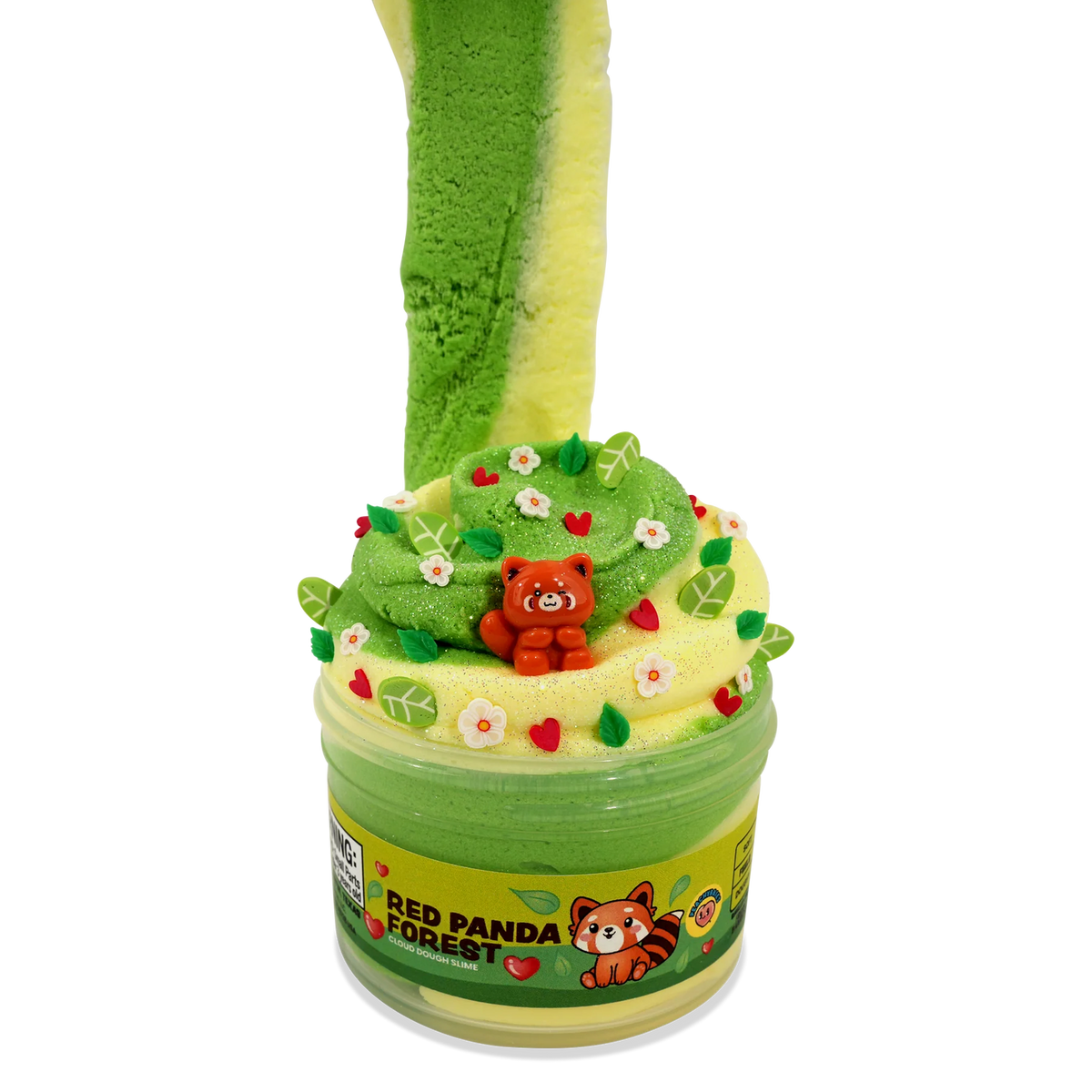 A novelty slime container labeled 'RED PANDA FOREST' filled with two-toned green and yellow slime, topped with a small orange racoon figure and decorated with colorful flower and leaves, on a black background.