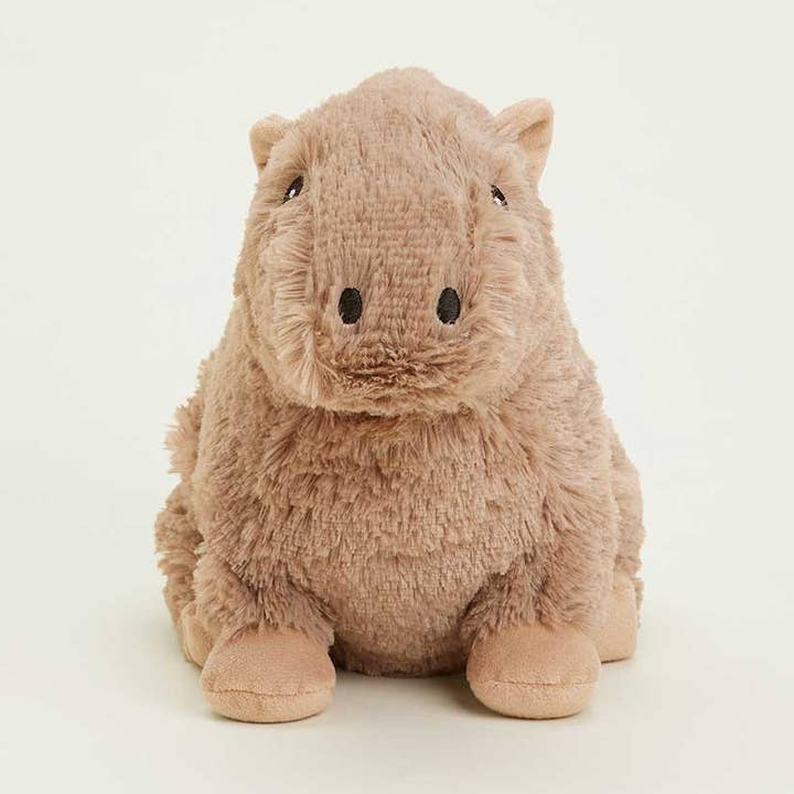 Plush hippo toy on a white background