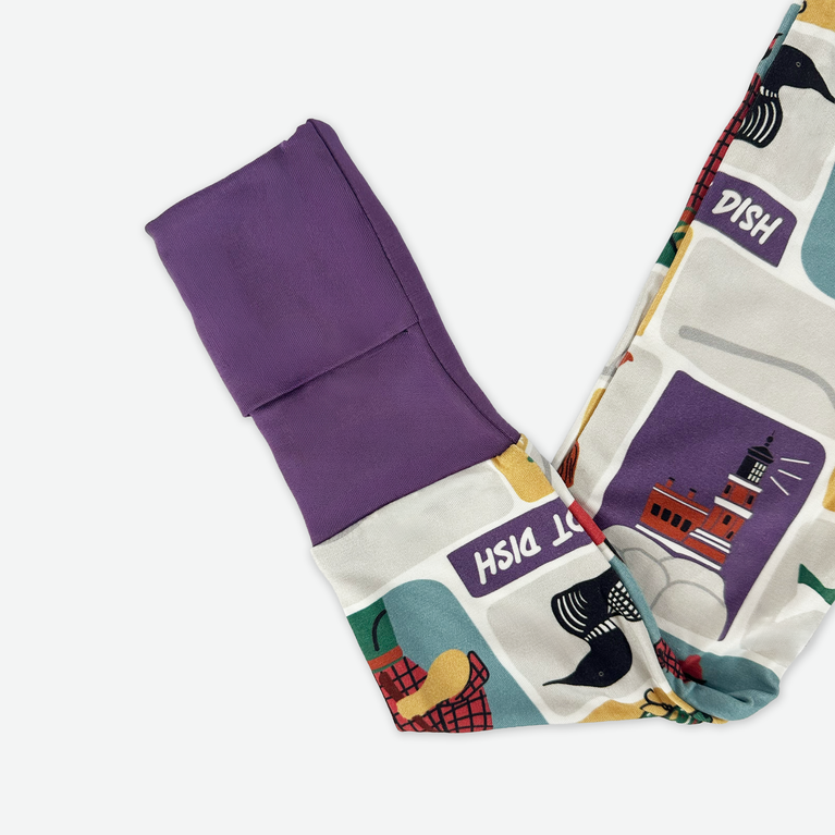 Set of colorful dish towels with geometric patterns on a white background
