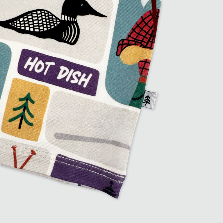 Fabric with colorful patterns and text on a white background