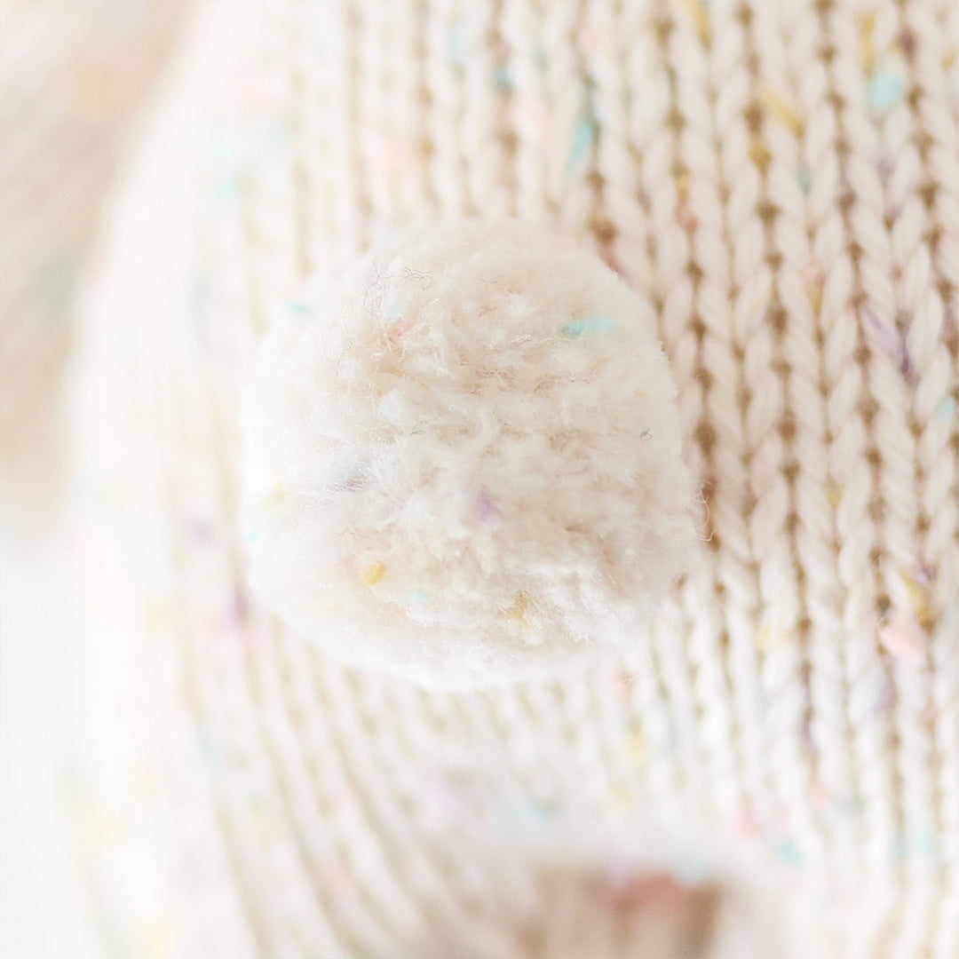 Close-up of a ball of yarn with multicolored fibers.