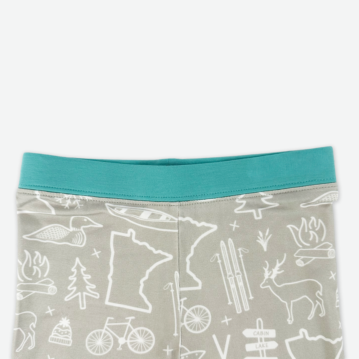 Gray leggings with white patterns on a white background