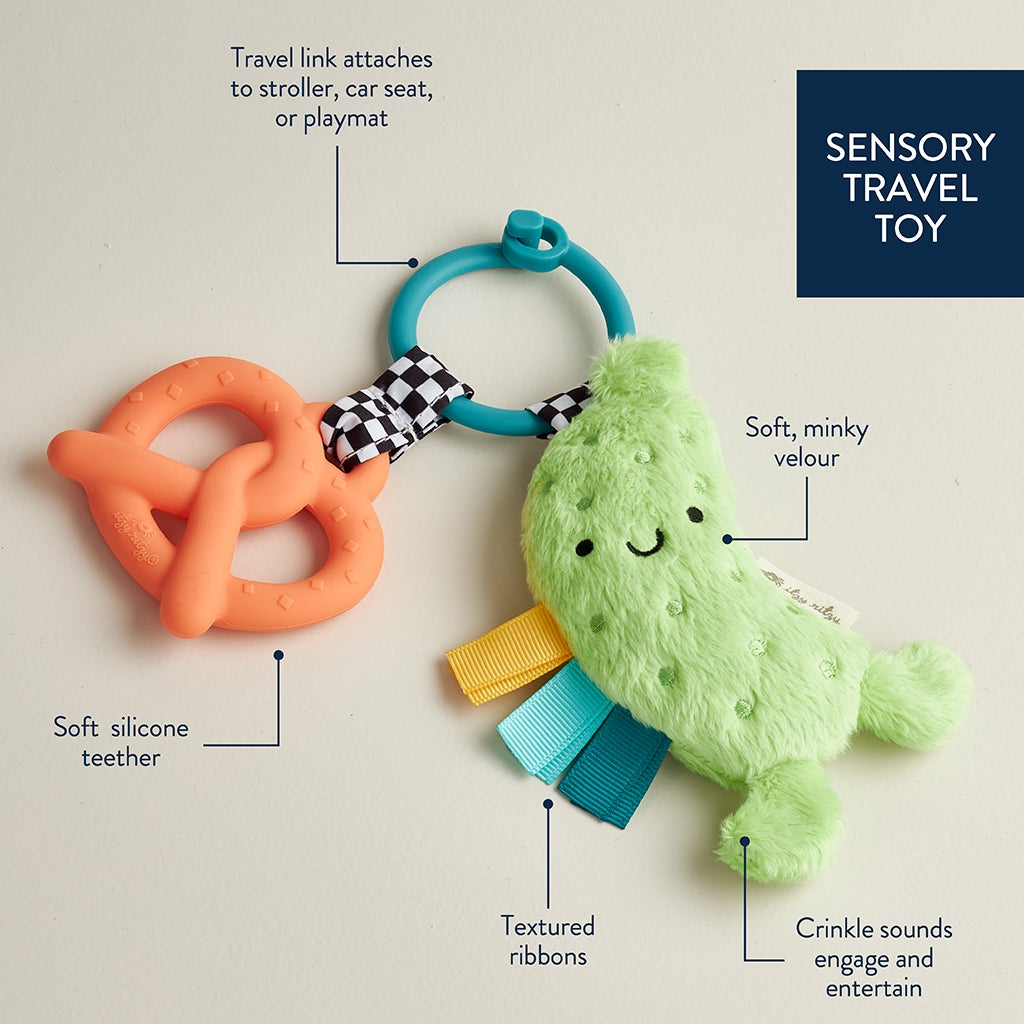 Sensory travel toy with features highlighted on a beige background