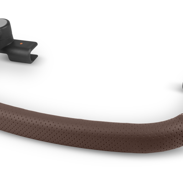A curved baby carrier handlebar with a brown perforated faux-leather grip and black plastic mounting arms, shown on a solid white background.