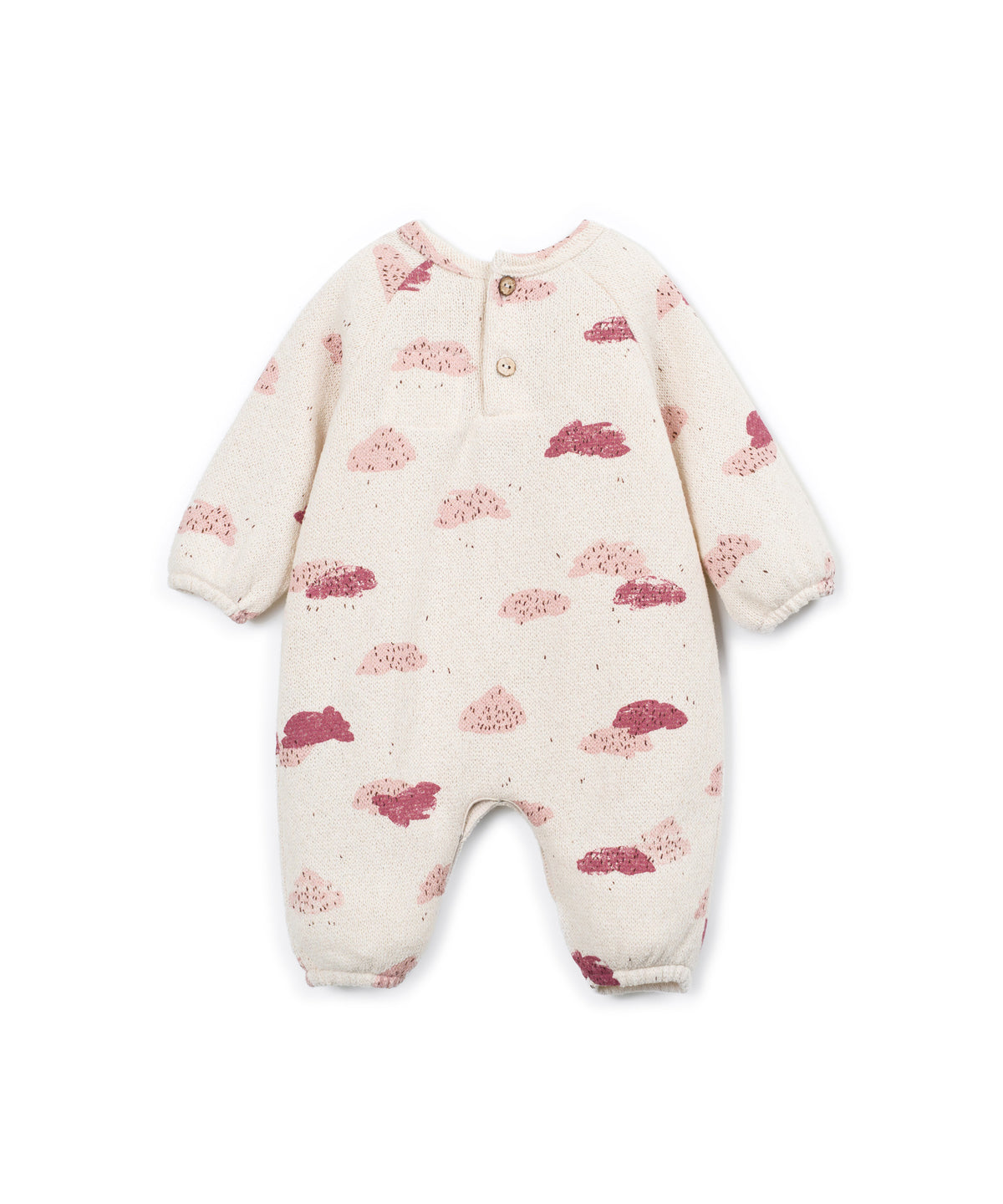 A baby long-sleeve footless one-piece romper in cream-colored fabric with a scattered pink and dusty rose cloud pattern, featuring a three-button snap closure at the collar.