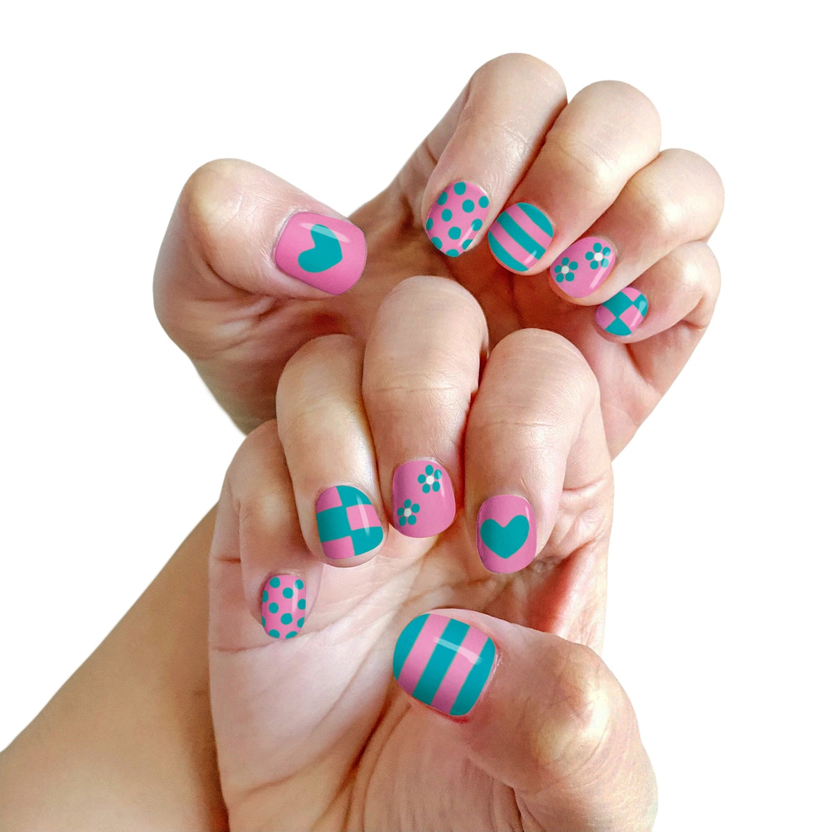 Hand with colorful nail art on a white background
