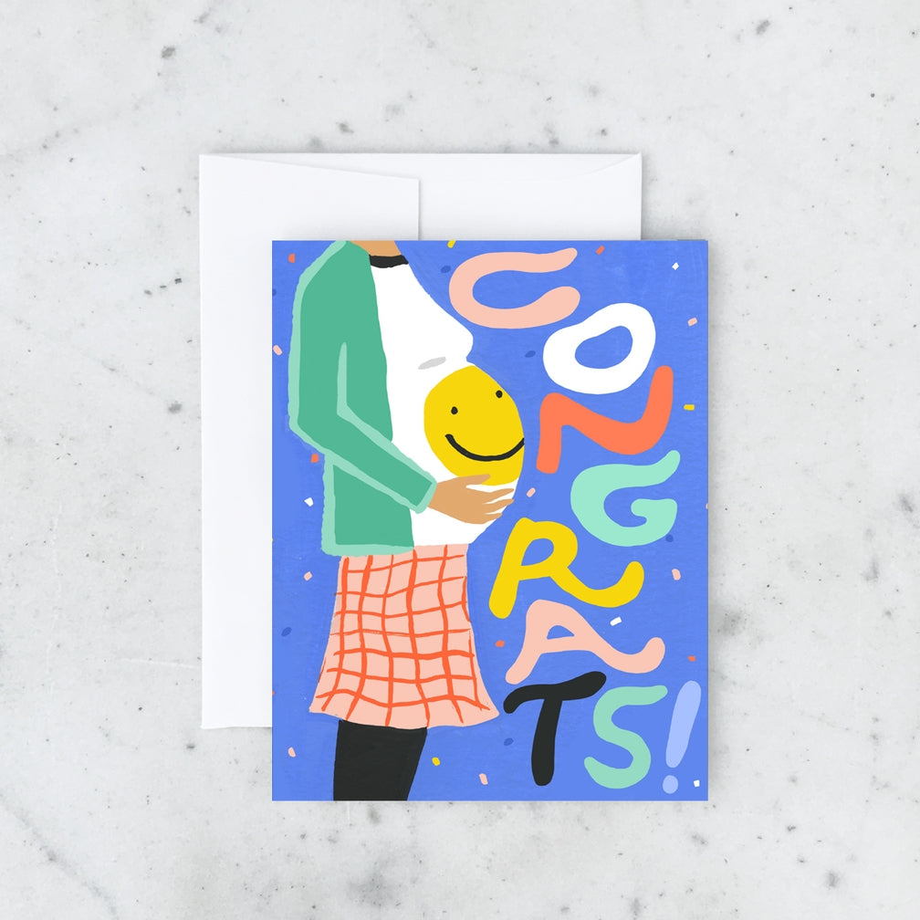 Greeting card with colorful illustration of a person and child, and 'Congrats!' text on a marble background.