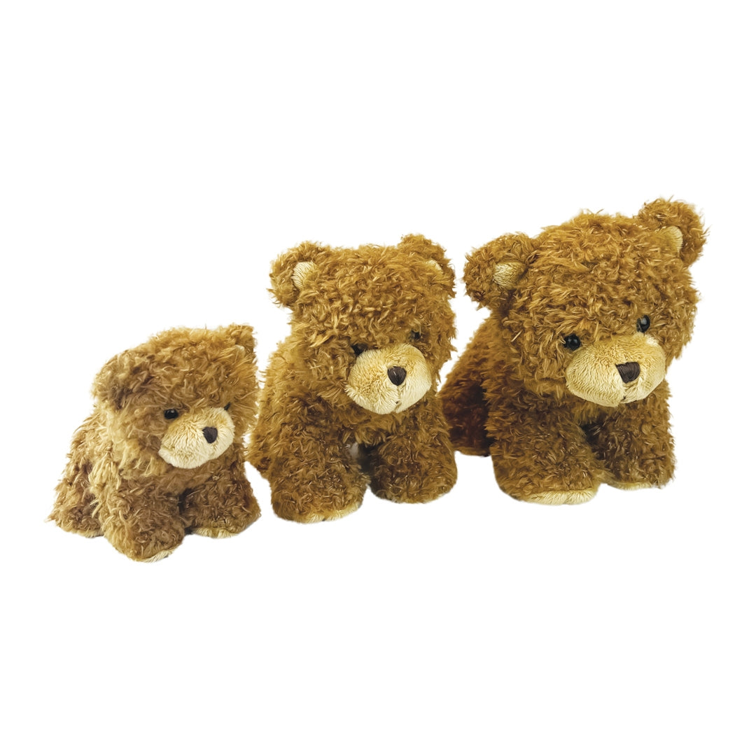 Three small brown plush teddy bears in different sizes, arranged from smallest to largest on a plain white background.