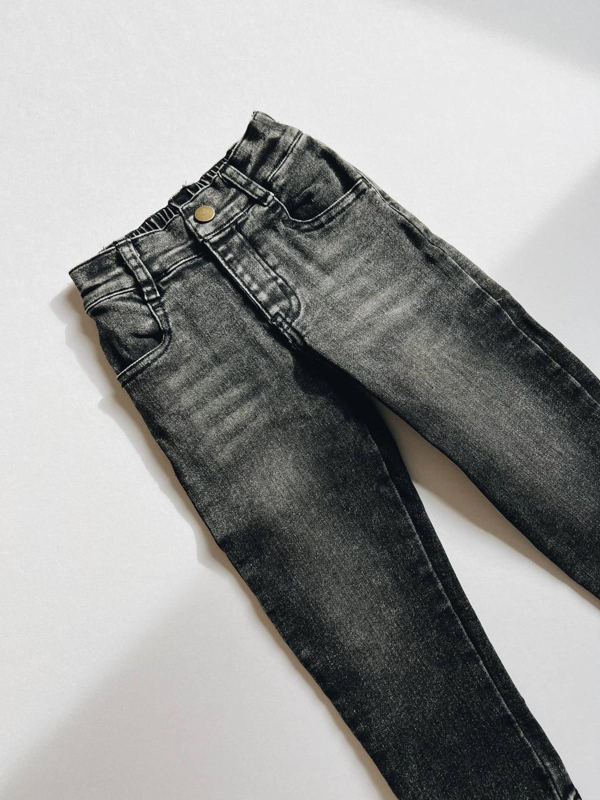 Black jeans on a white background
