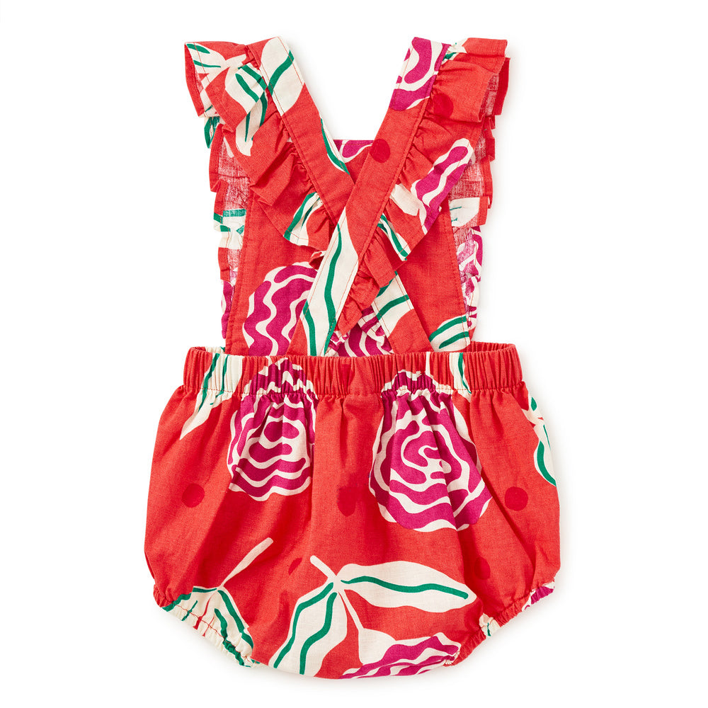 Red floral baby romper on a white background