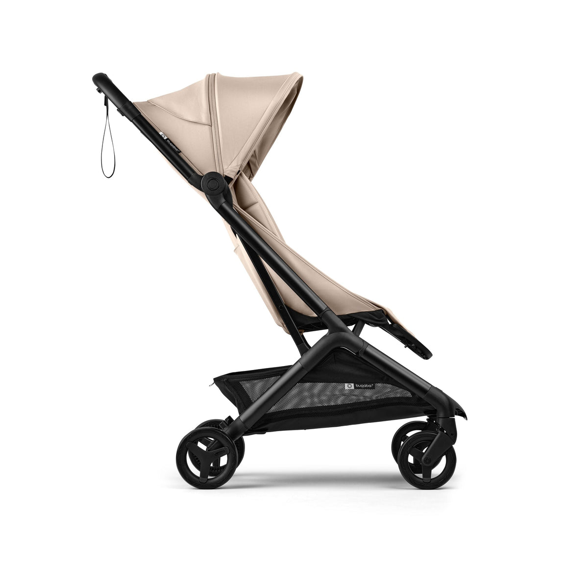 Beige and black stroller on a white background