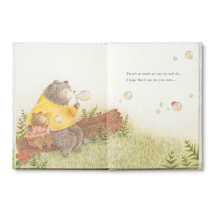 Illustrated book page with two animals sitting together in a forest setting.