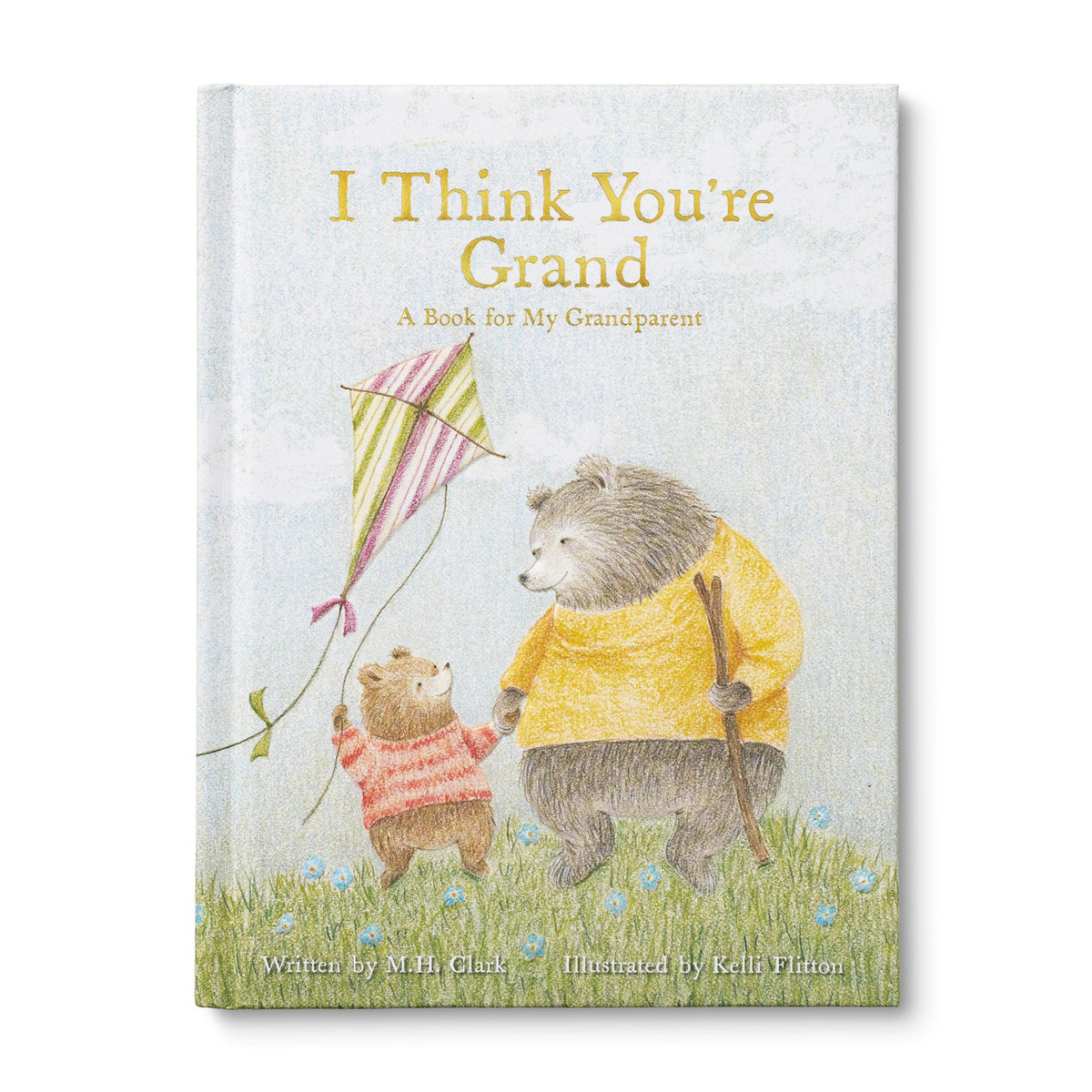 A hardcover children's book titled "I Think You're Grand" with a textured light blue cover, featuring an illustration of a bear grandfather and bear grandson flying a striped green and pink kite in a grassy field. The book is photographed upright against a clean white background.