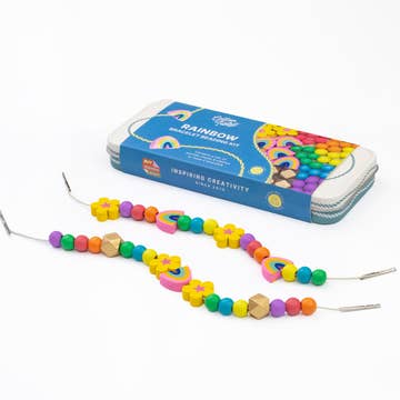 Colorful bead stringing kit with beads and packaging on a white background