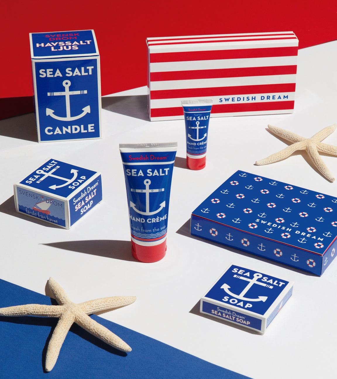Collection of Swedish Dream sea salt products including soap, cream, and candles on a red, white, and blue background.