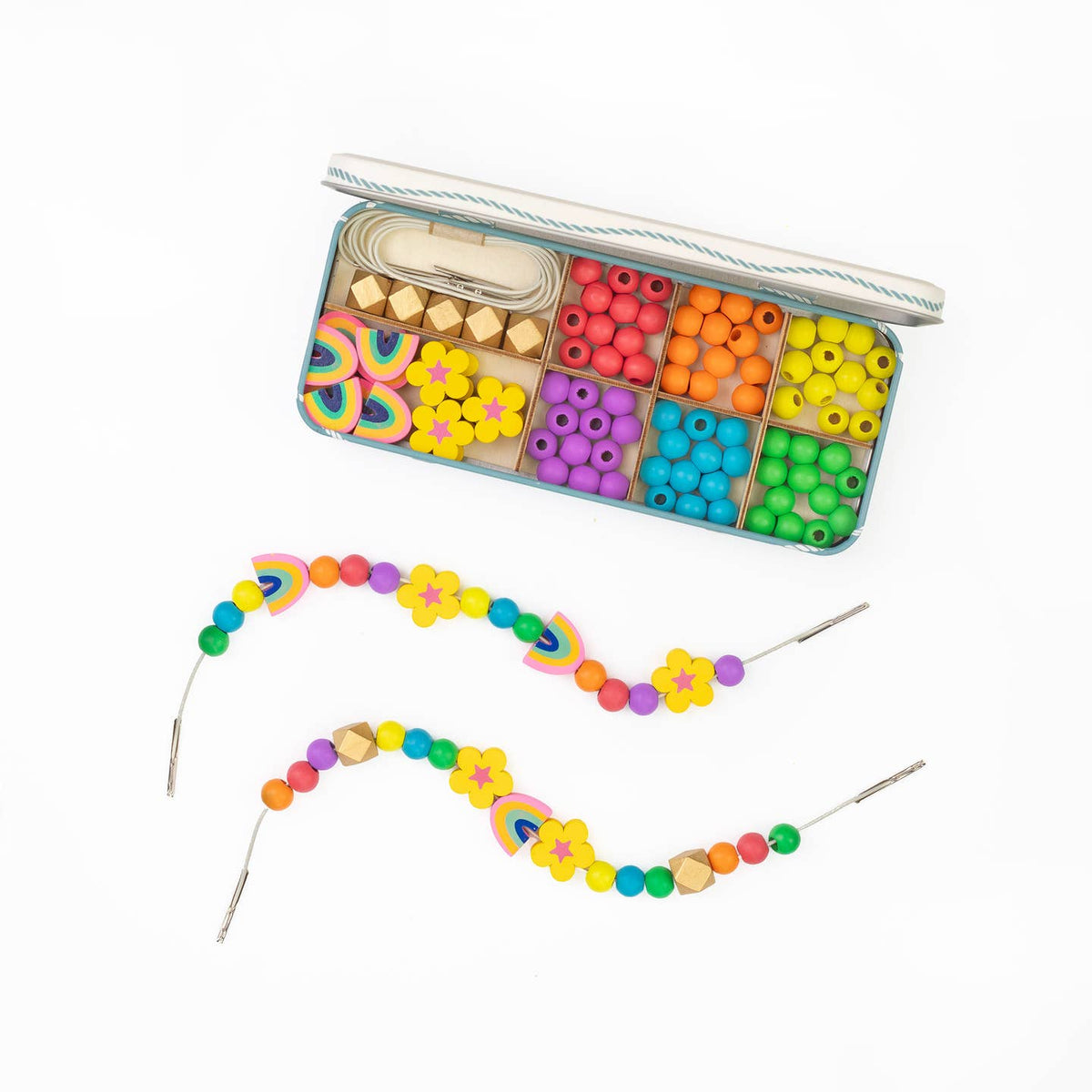 Colorful bead set with a completed necklace on a white background