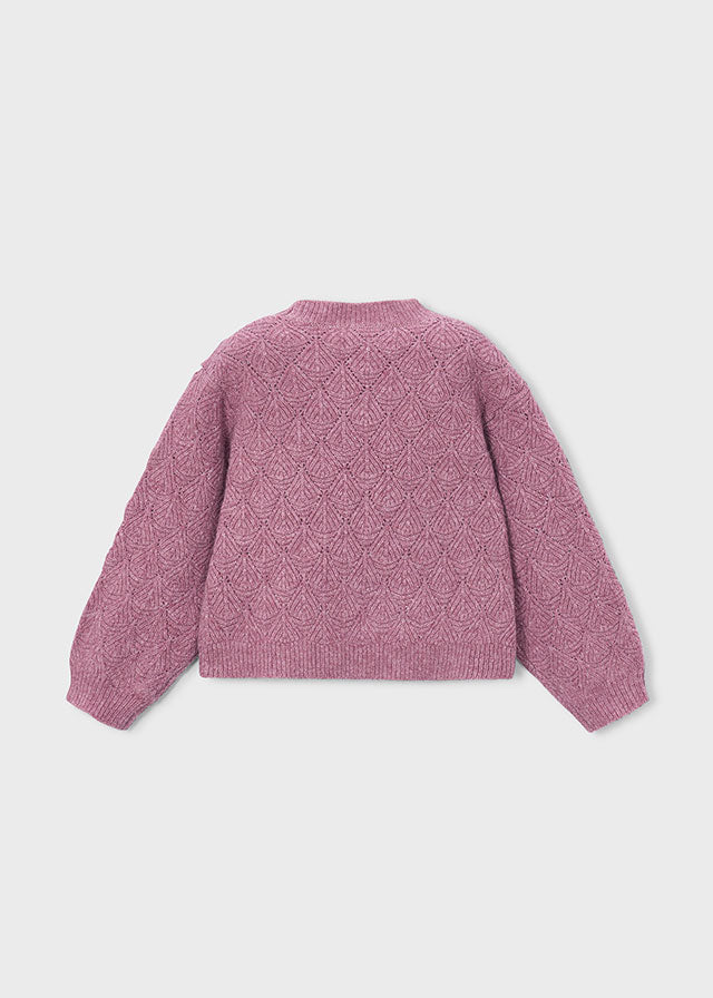 A dusty pink textured knit sweater with a diamond cable pattern, shown from the back on a plain white background.