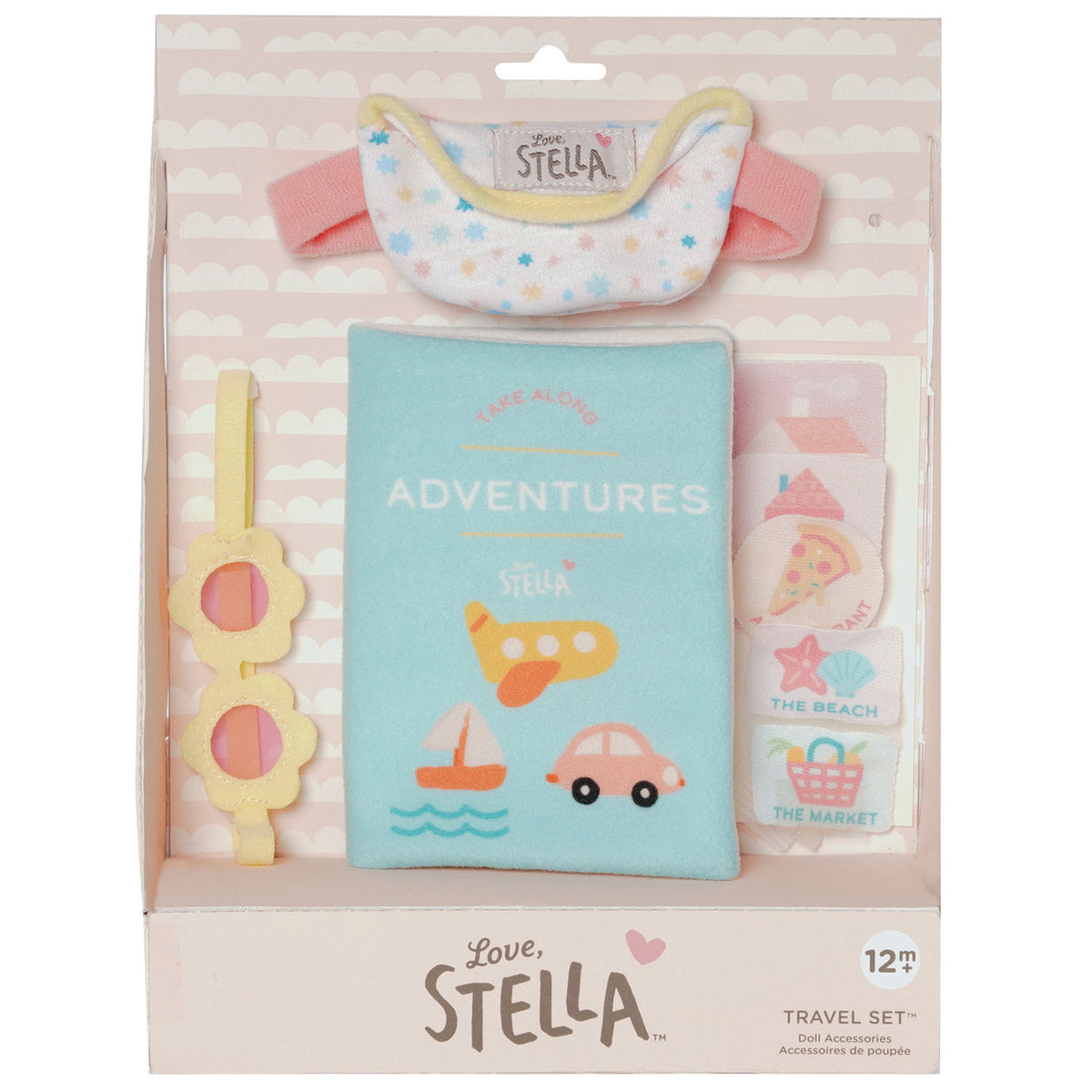 Stella travel set packaging with baby items including a bib, book, and toys.
