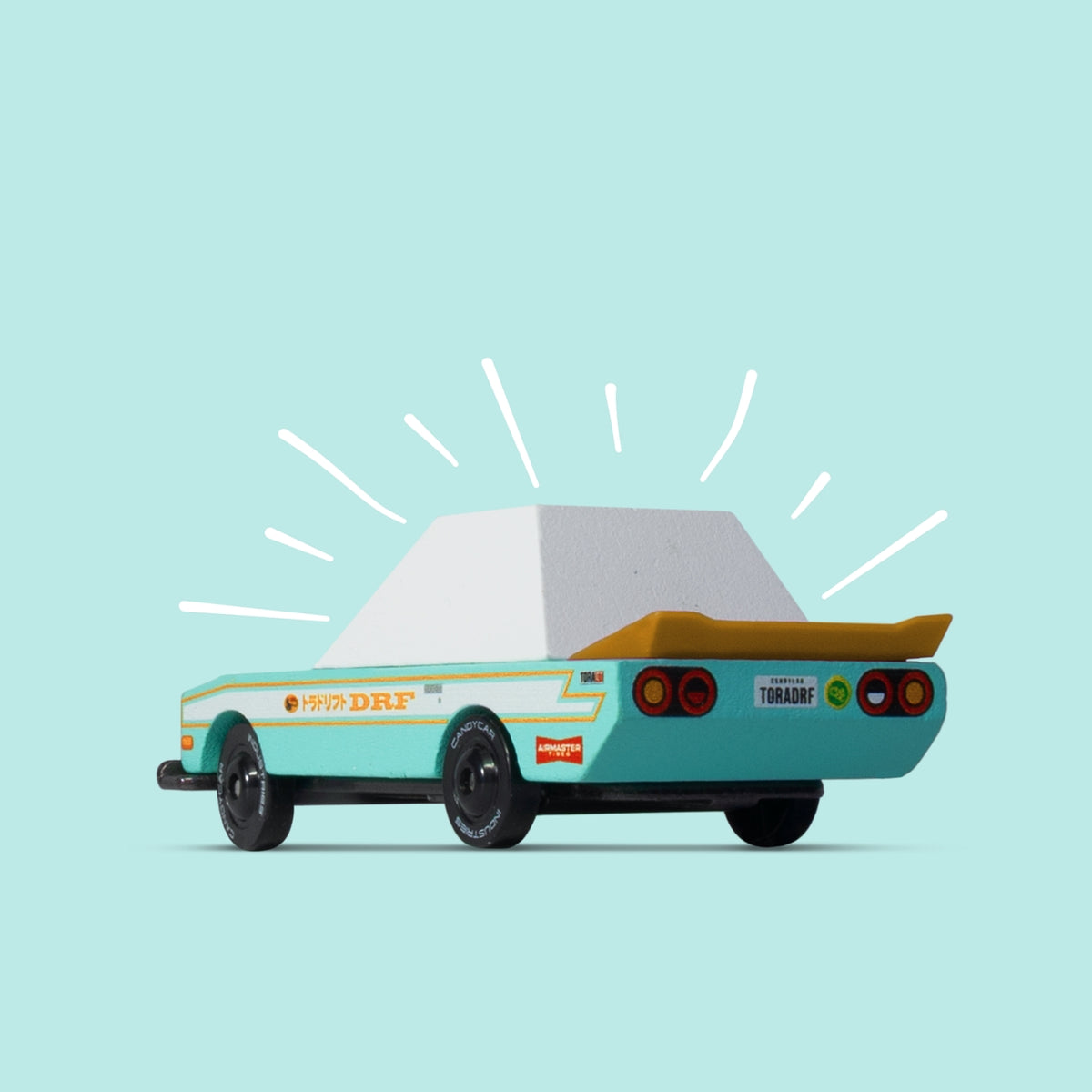 Toy car with a white roof on a light blue background