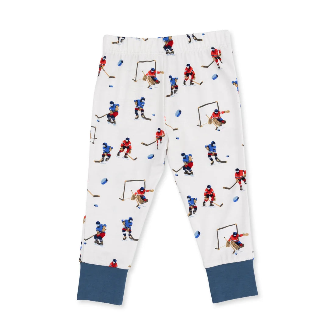 White kids' jogger pants with an all-over hockey player print and solid navy blue cuffed hems, shown flat on a white background.