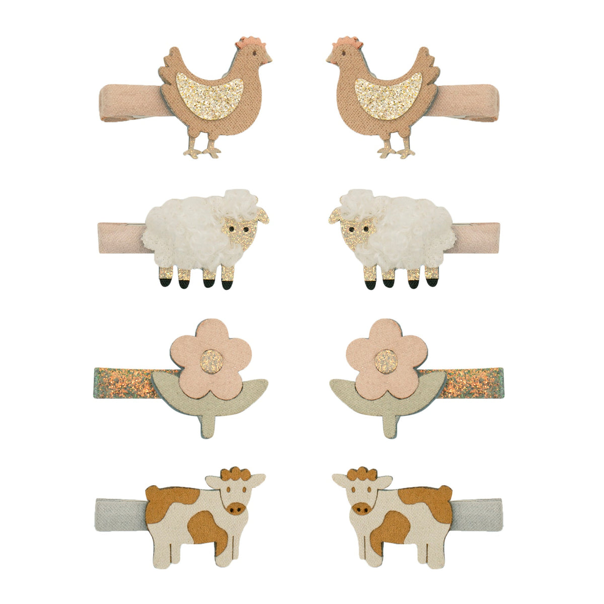 Set of six animal-themed hair clips on white background