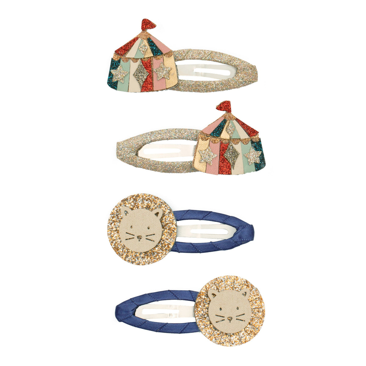 Set of four hair accessories with circus tent and lion designs on a white background
