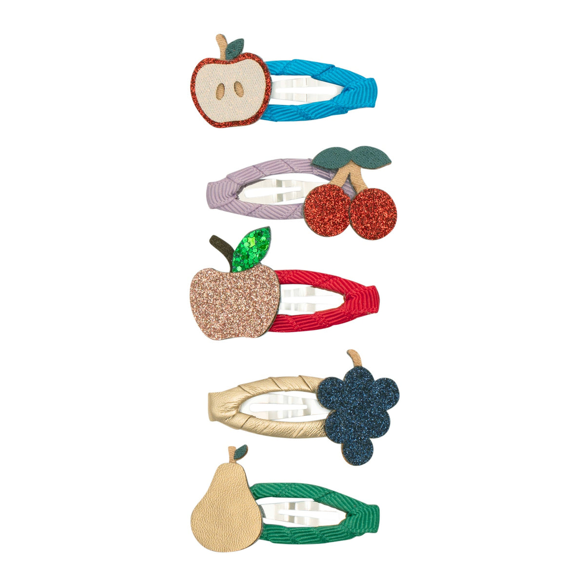 Set of colorful fruit-themed hair clips on a white background