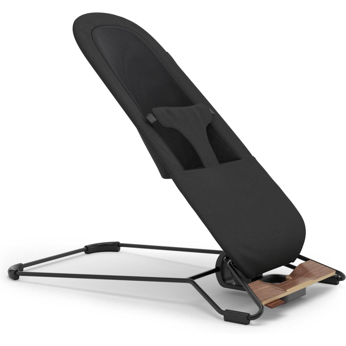 A modern black adjustable baby support seat with a minimalist black metal frame and a natural wood base, shown on a clean white background.