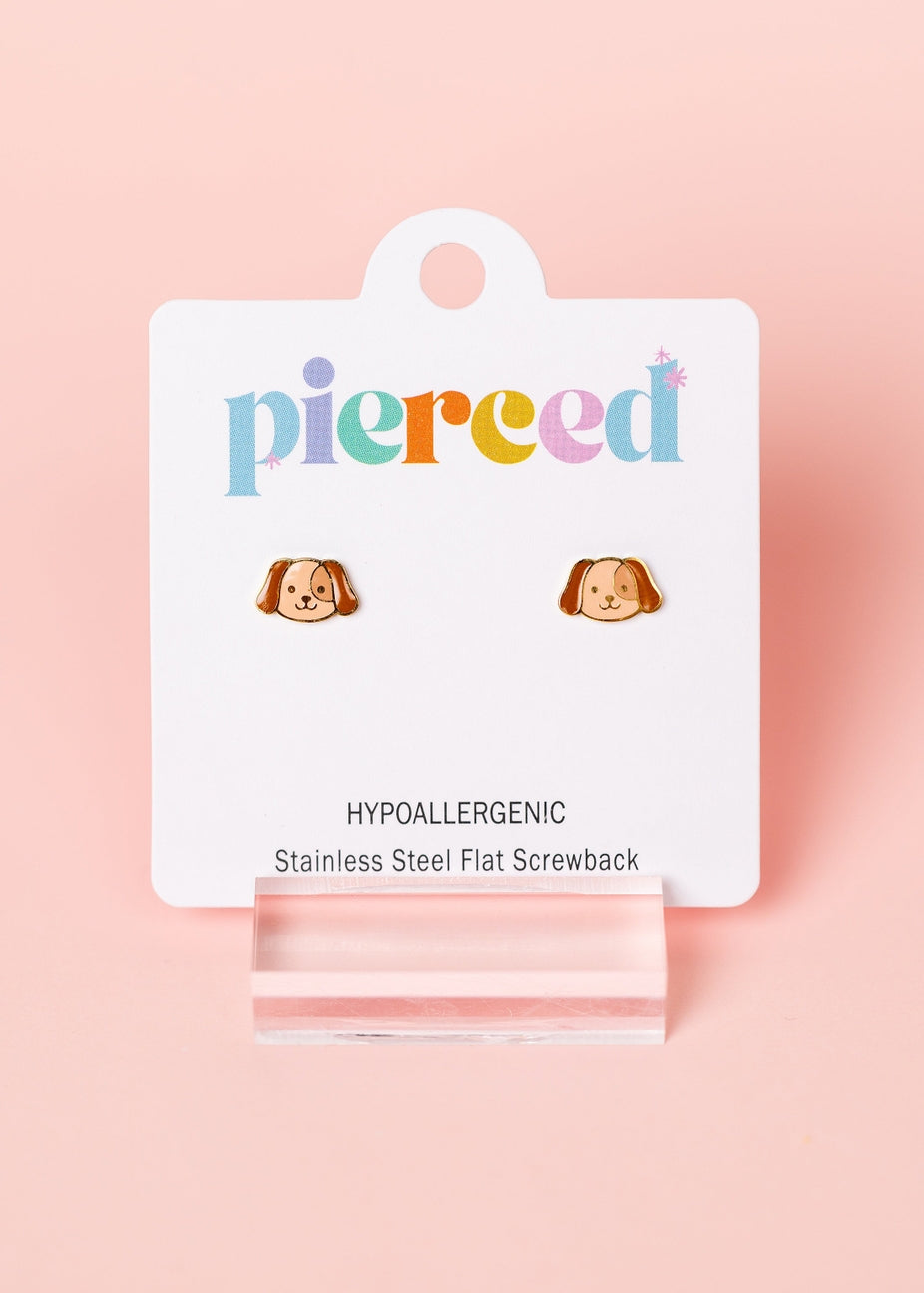 Earring packaging with 'pierced' branding on a pink background