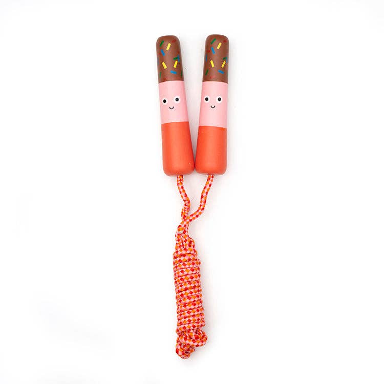 Children's jumping rope with cartoon faces on the handles against a white background