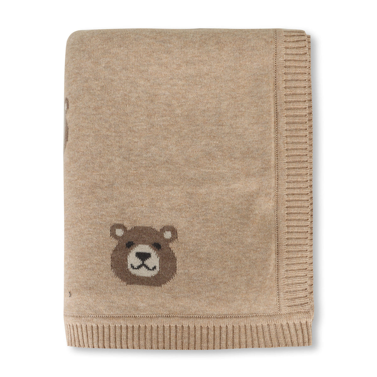 Beige knitted blanket with a bear face design on a white background