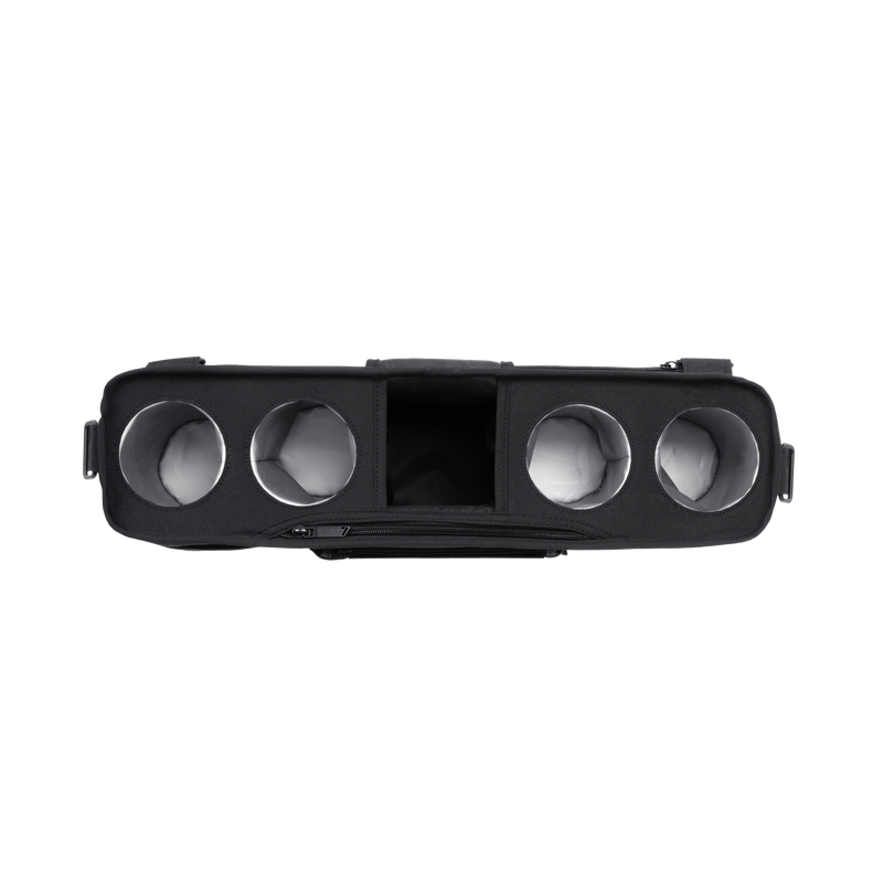 Black car air vent with four circular slots on a white background