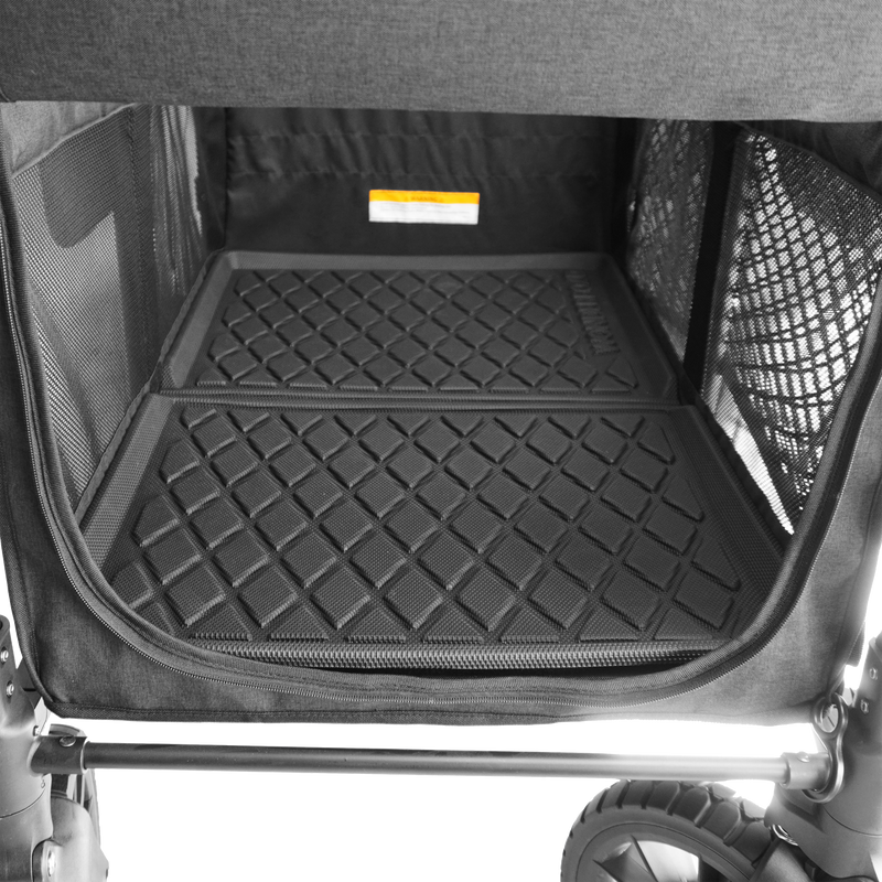 Black diamond-patterned liner inside a pet carrier