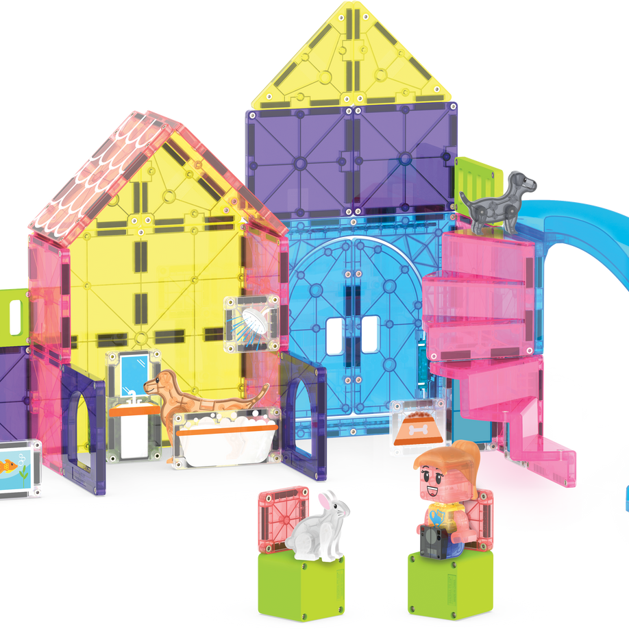 Colorful toy building set with a slide on a white background