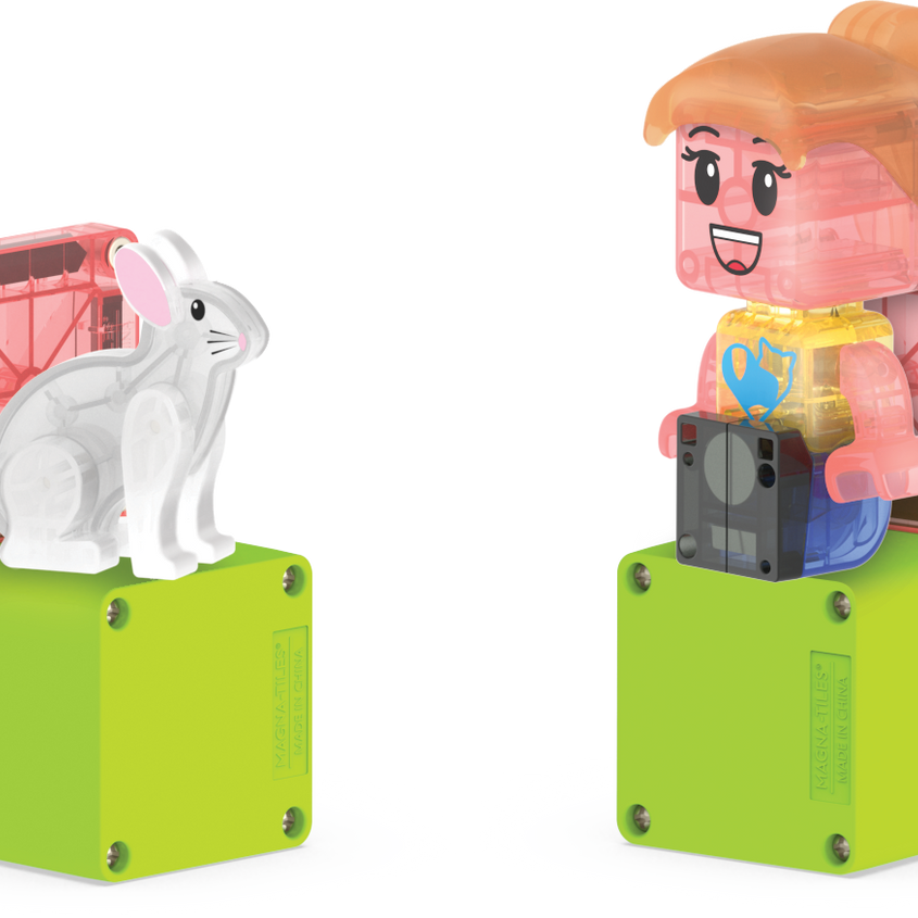 Toy figure of a girl with a rabbit on a white background