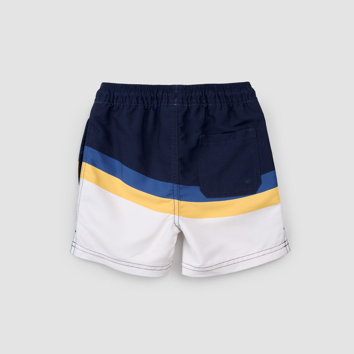 Color-blocked shorts with navy, yellow, and white on a light gray background