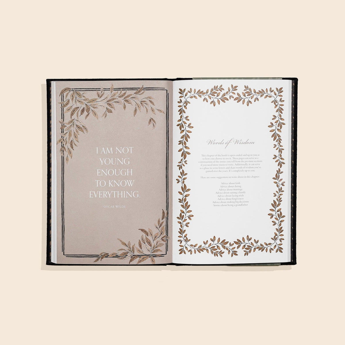 Open book with decorative pages and a quote on a beige background