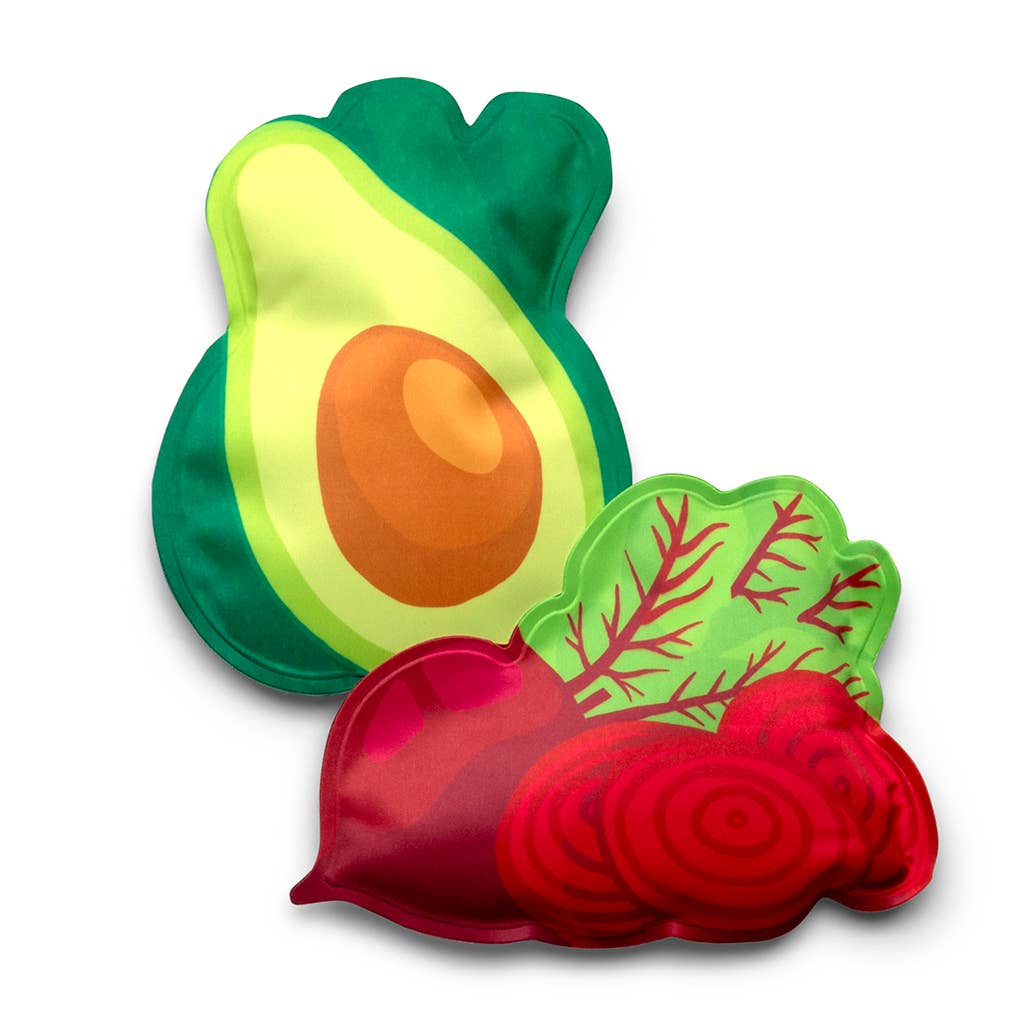 Three avocado-themed bath or body pillows arranged on a white background, featuring green avocado halves, a red beet slice, and a green leaf design.
