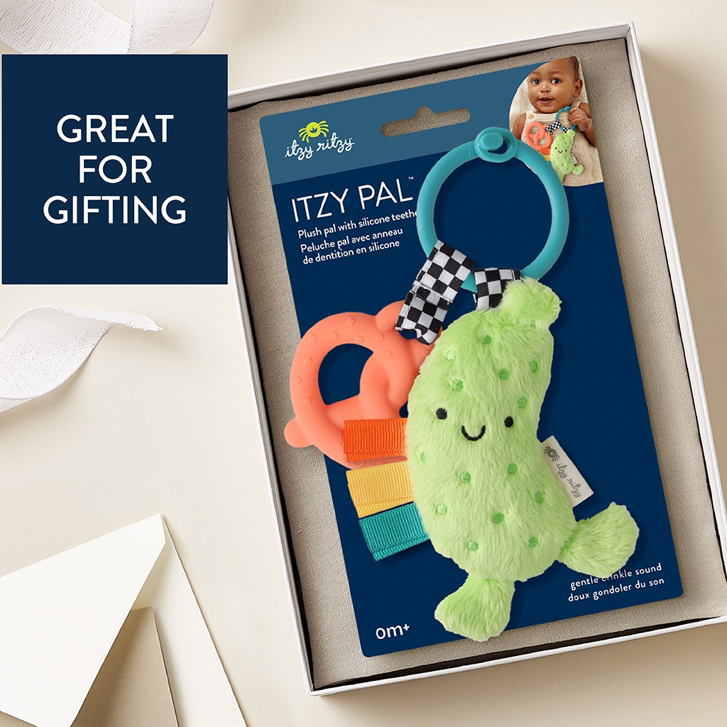 Itzy Ritzy Itzy Pal plush toy with teether and keychain in packaging on a light background
