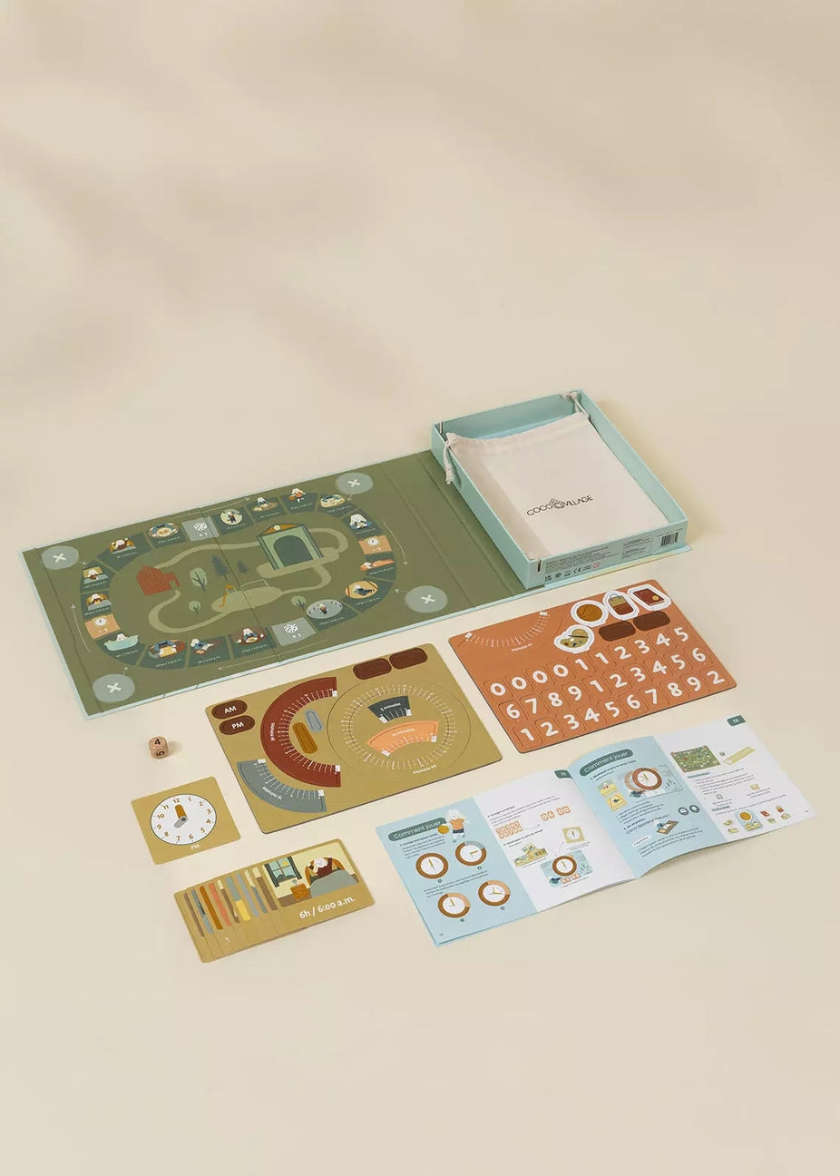 Educational children's play mat with cards and a box on a beige background