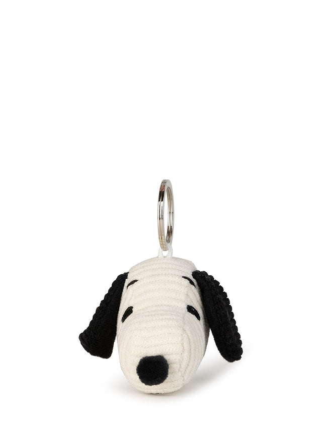 Dog-shaped keychain on a white background