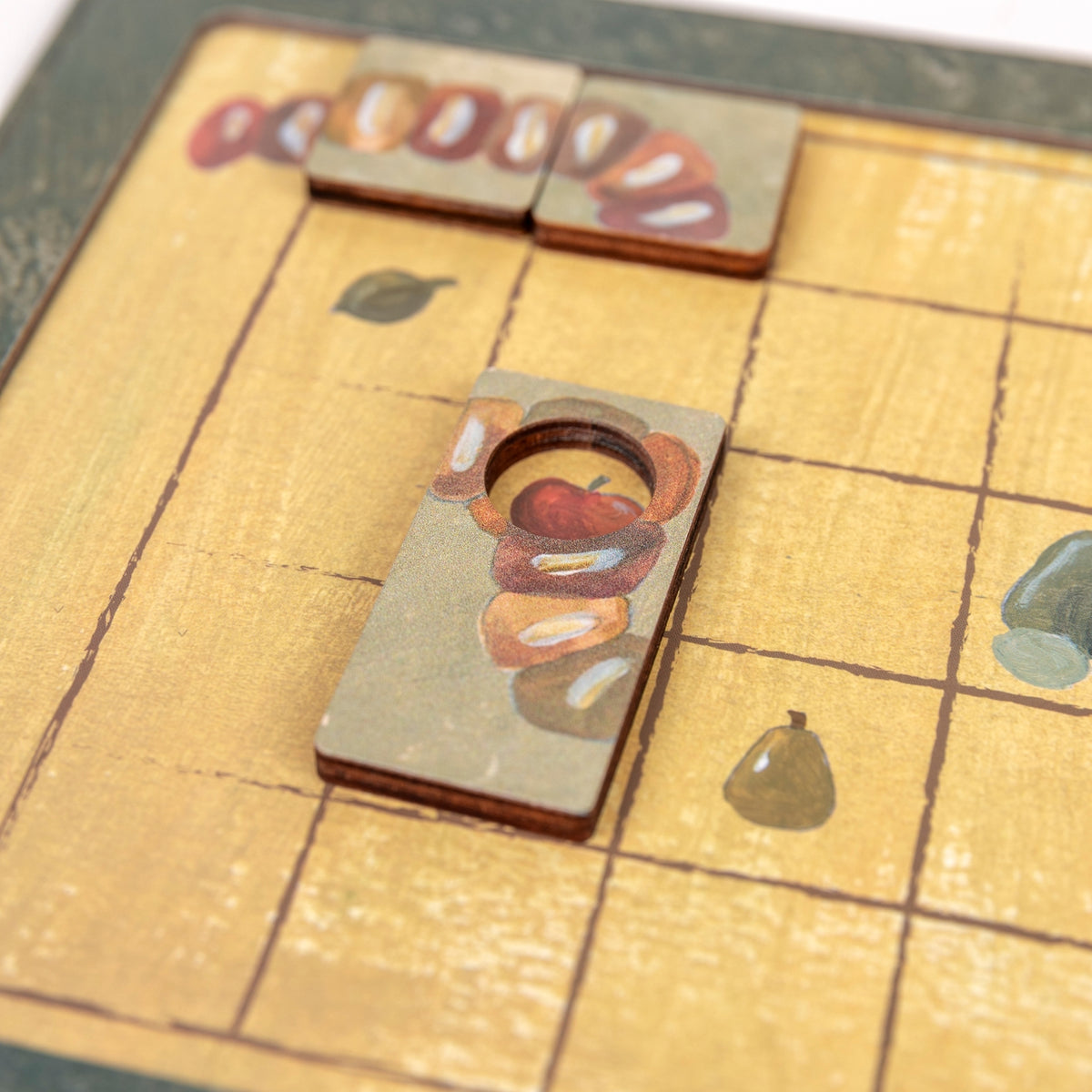 Close-up of a wooden board game piece on a checkered board