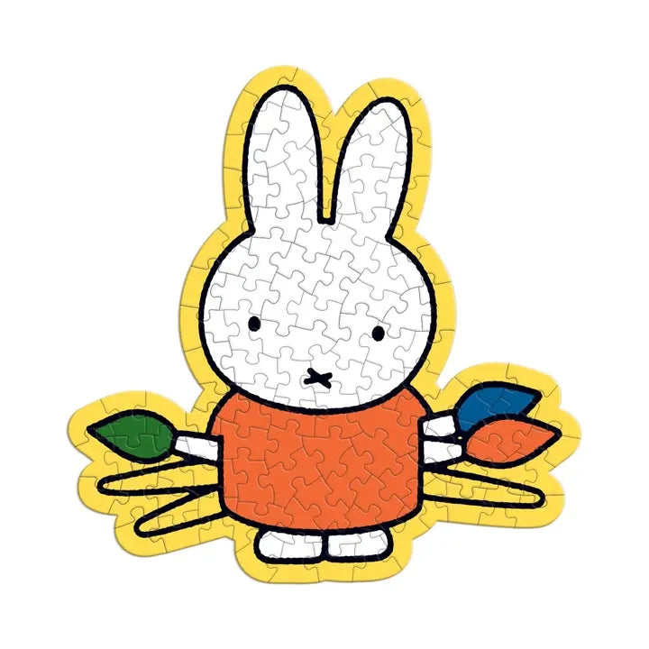 Jigsaw puzzle of a cartoon rabbit character with a carrot, on a white background