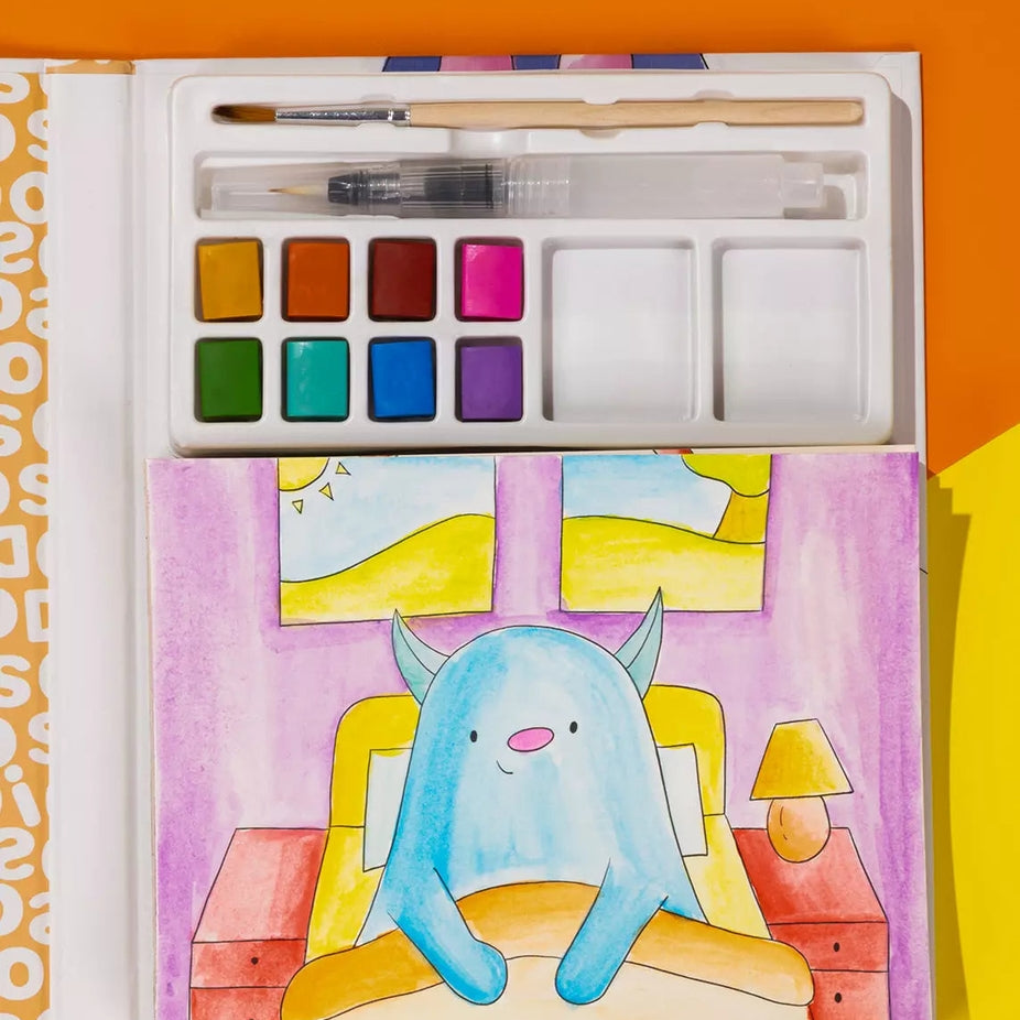 Artistic depiction of a blue creature in a room with watercolor paints and brushes.
