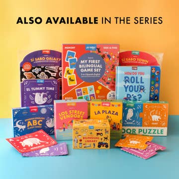 Collection of educational children's books and games on a blue surface with a yellow background