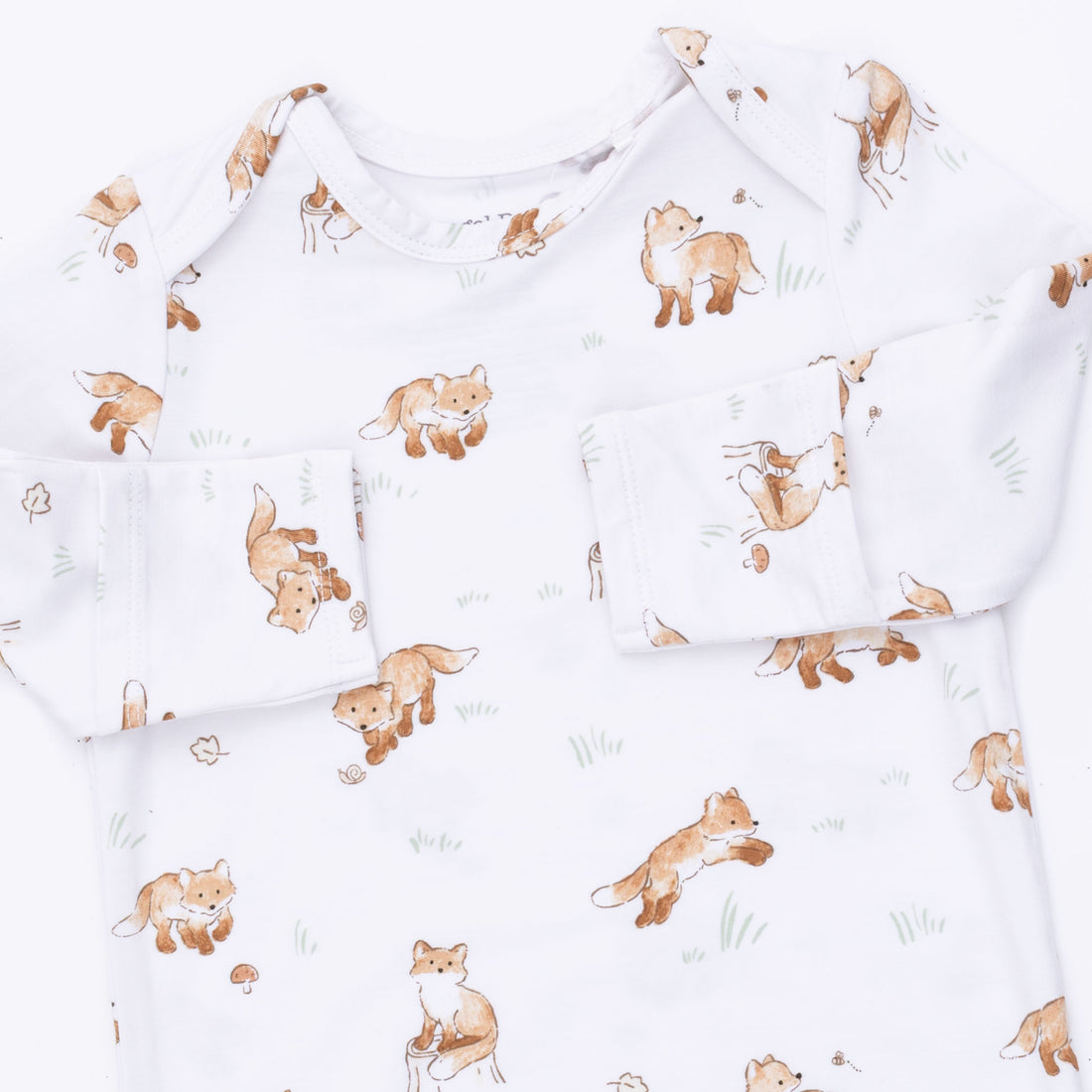 Baby clothing set with fox pattern on a white background