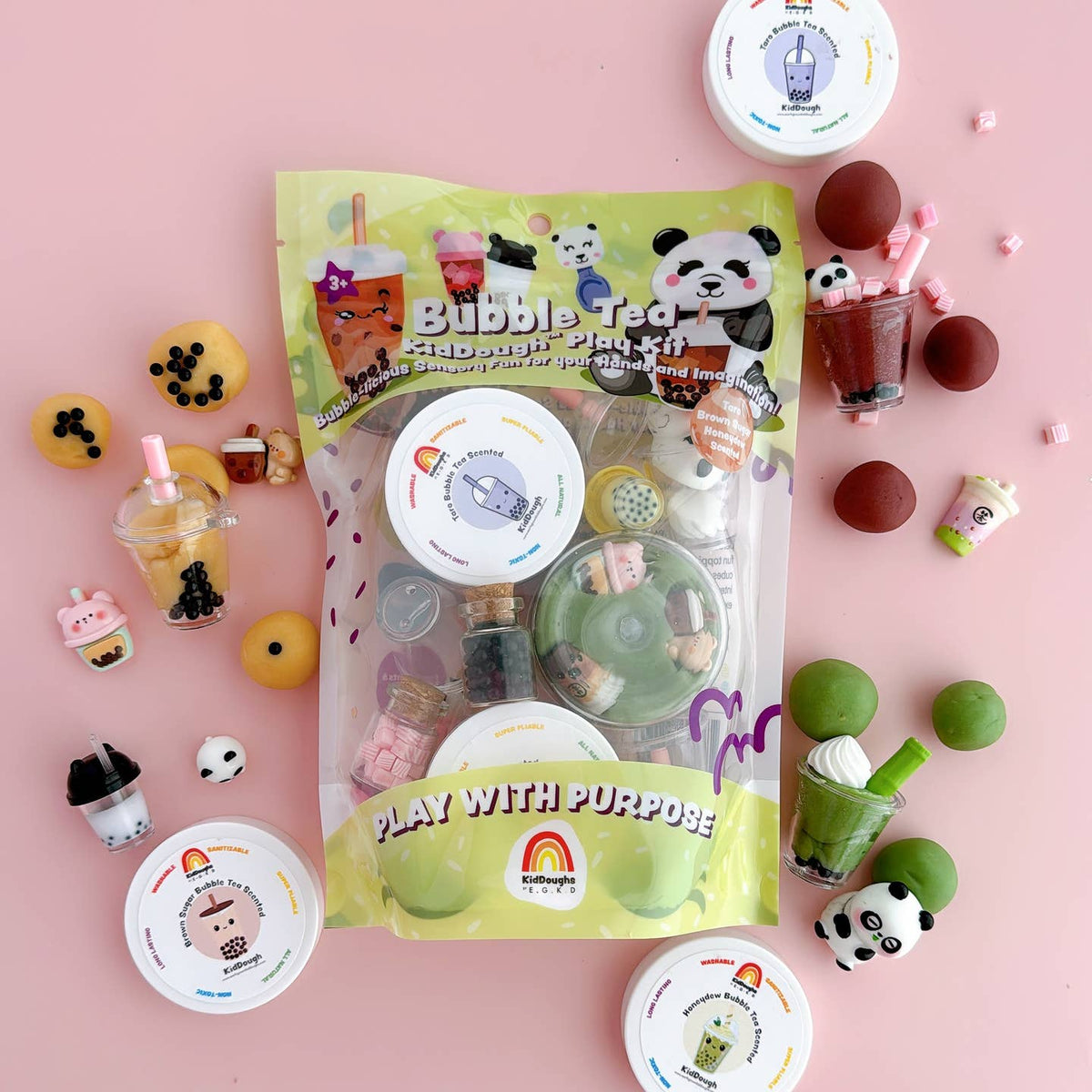 Bubble tea-themed playset with packaging on a pink background