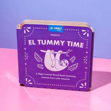 Purple children's book titled 'El Tummy Time' on a pink and purple gradient background