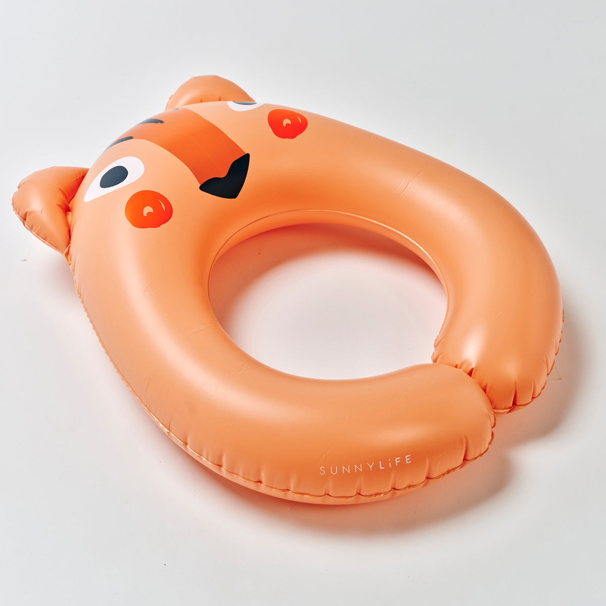 Orange inflatable pool float shaped like a cat with 'Sunnylife' branding on a white background
