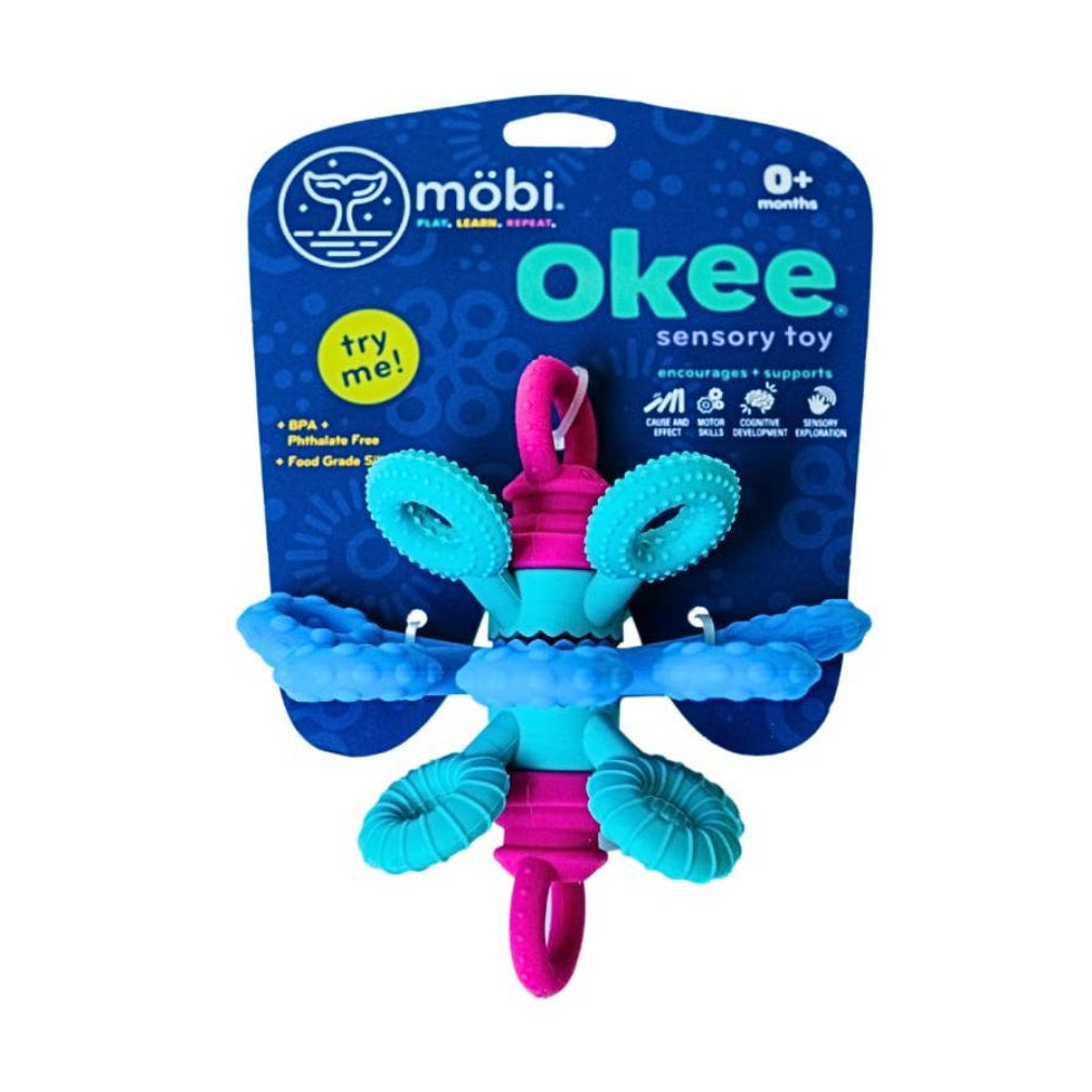 Blue and pink okee sensory toy with Mobi packaging on a white background
